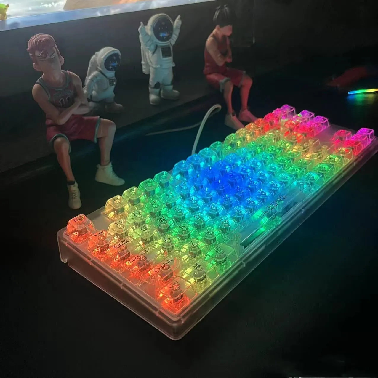 Transparent plastic 132-key mechanical keyboard key cap set displayed on white background