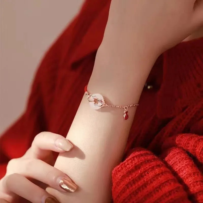 Festive koi women's bracelet with fishtail pattern and red rope closure in Japanese South Korean style
