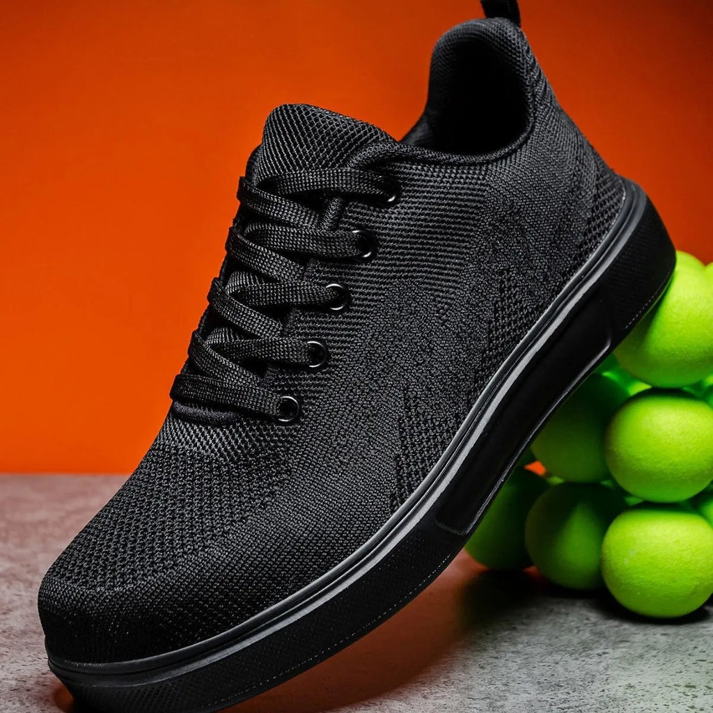 Unisex casual sports shoes with thick EVA sole and mesh upper in black and white colour options