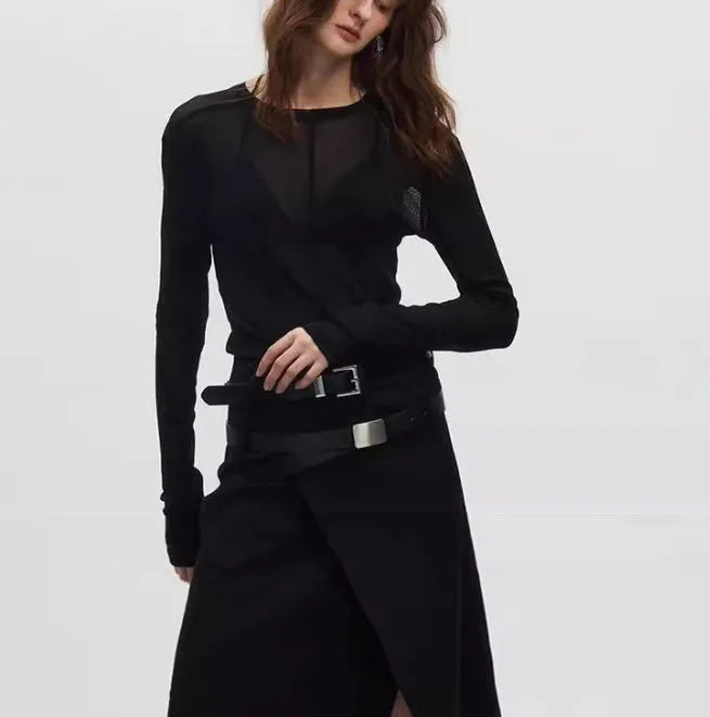 Black mesh see-through slim-fit long sleeve pullover on a hanger.