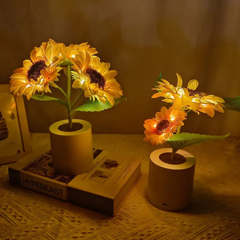 Rechargeable artificial sunflower LED night light on table with USB cable