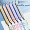 Set of double-headed fluorescent marking pens in bright colours on a white background.