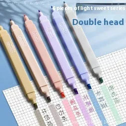 Set of double-headed fluorescent marking pens in bright colours on a white background.