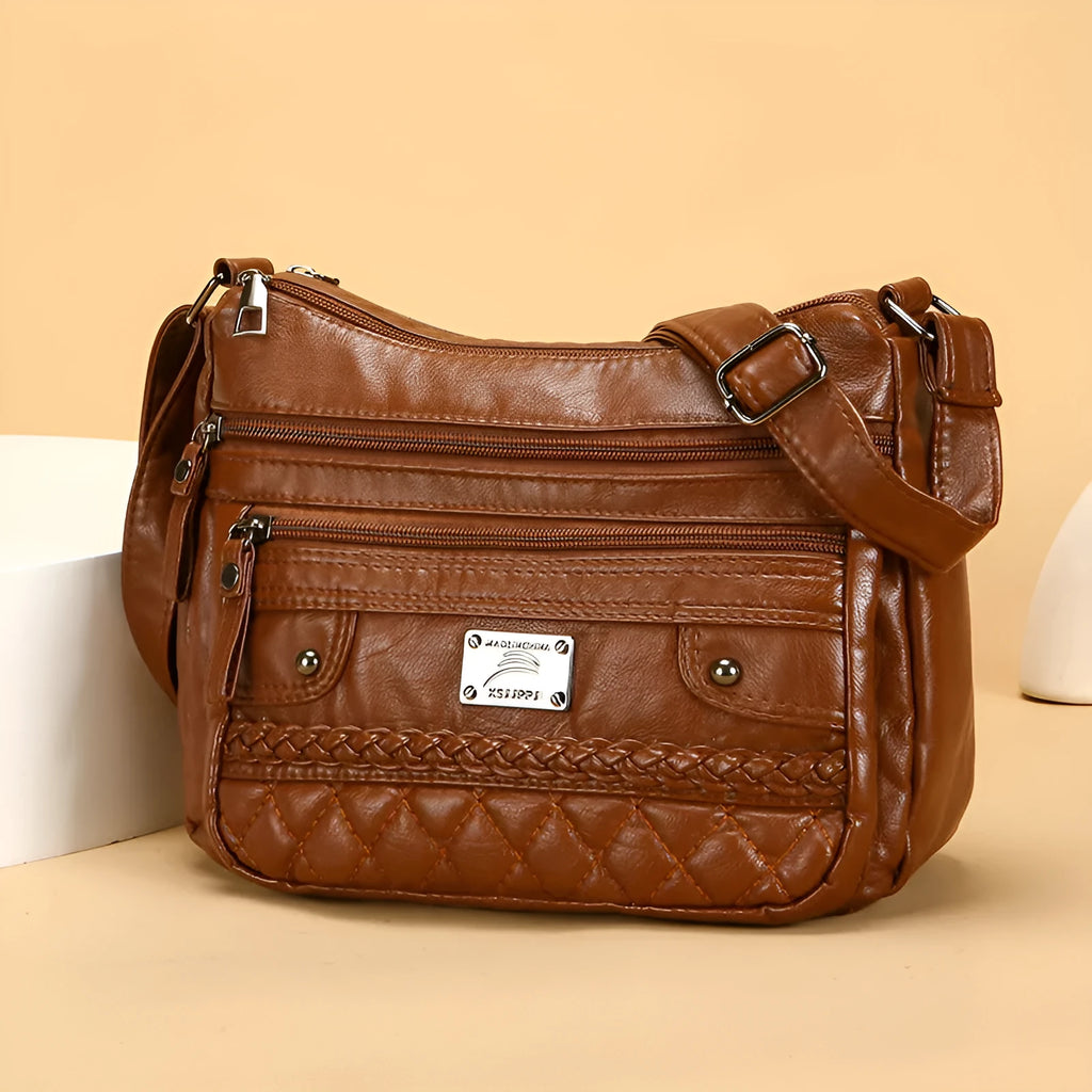 Soft PU leather shoulder bag in wine red with wash finish and outer pocket, 26x19x8cm