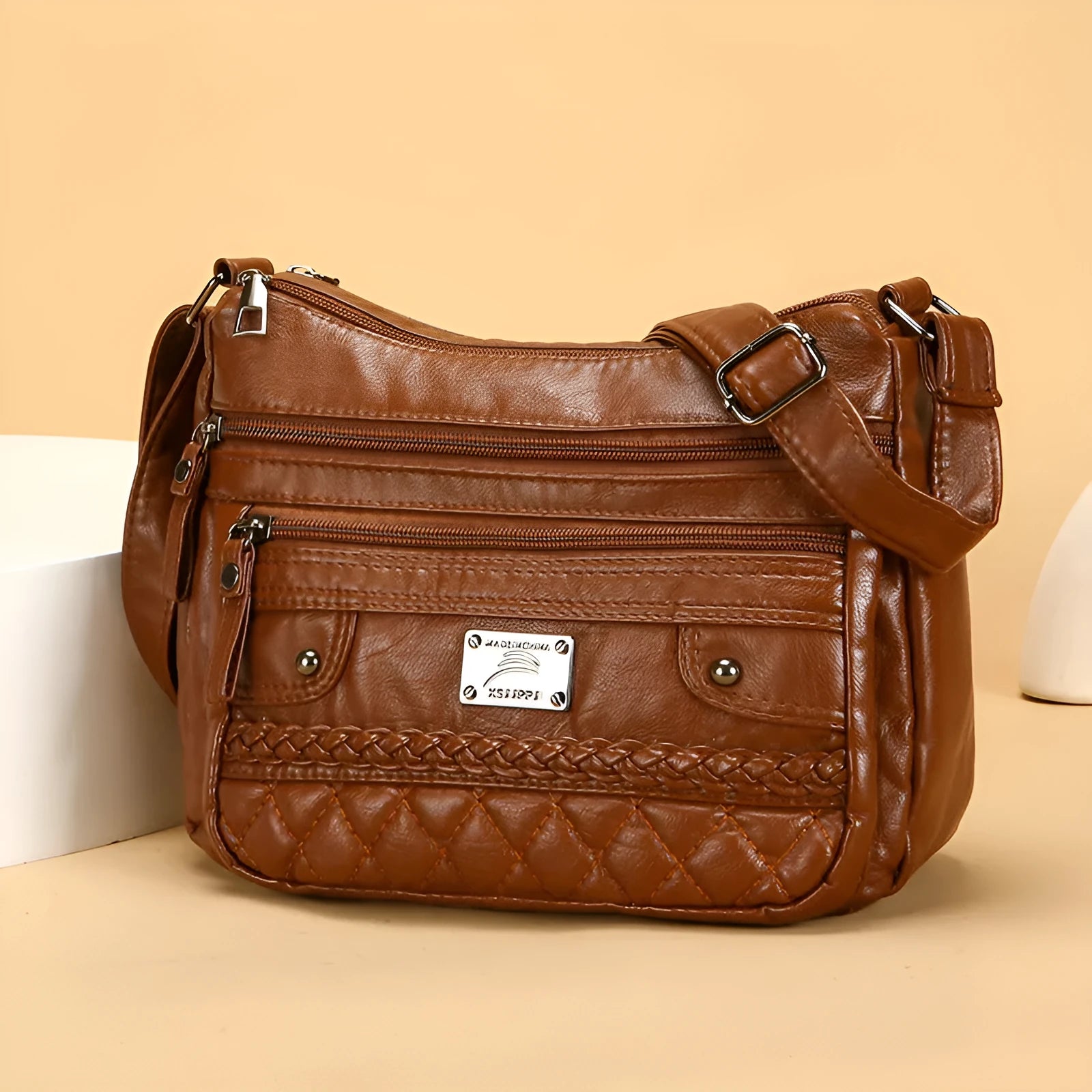 Soft PU leather shoulder bag in wine red with wash finish and outer pocket, 26x19x8cm