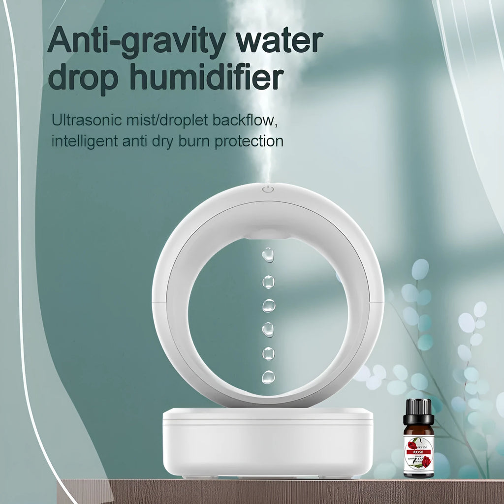 White round anti-gravity air humidifier with levitating water droplets on a desk