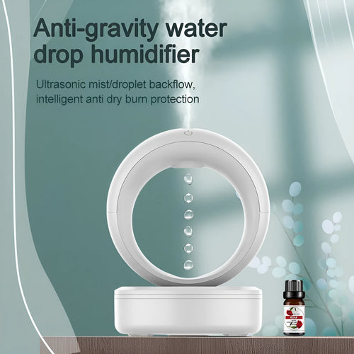 White round anti-gravity air humidifier with levitating water droplets on a desk