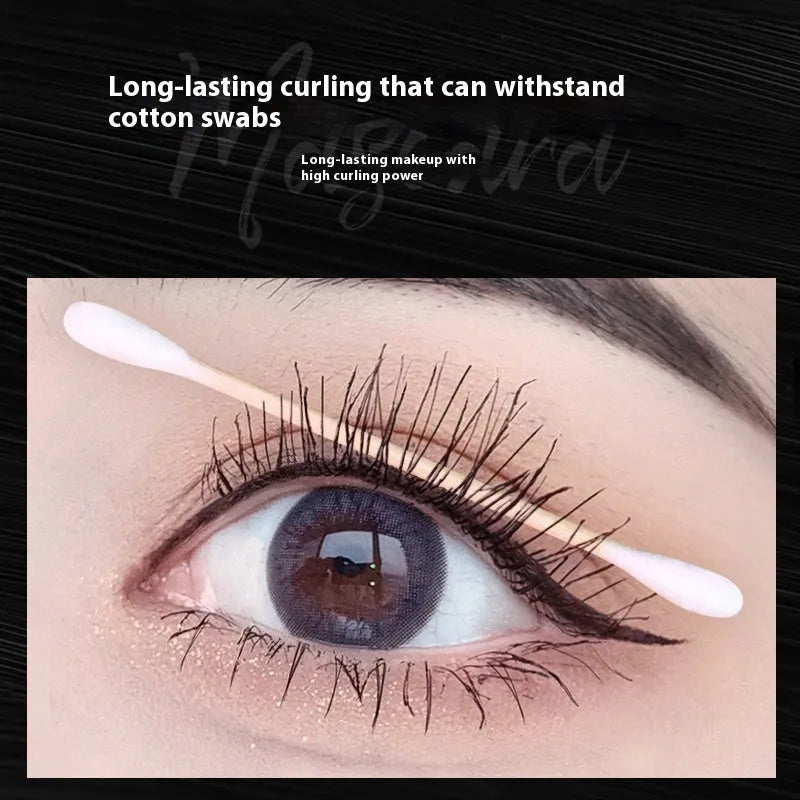 Black mascara in 14cm long tube with curved brush applicator for natural curly lashes