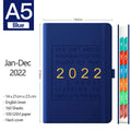 A5 imitation leather notebook with French fold binding open flat on a desk, seven colour options