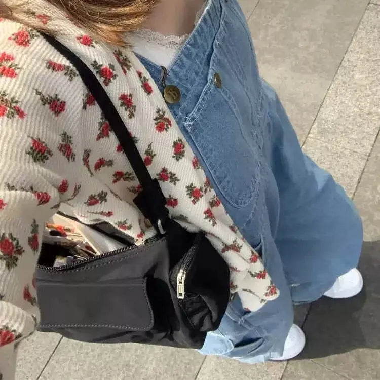 Black PU nylon women's shoulder bag with two pockets and side line detail showing dimensions