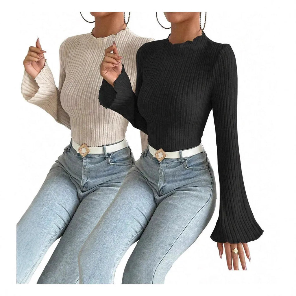 Long sleeve round neck slim fit top in black with lantern sleeves and a subtle sunken stripe pattern.