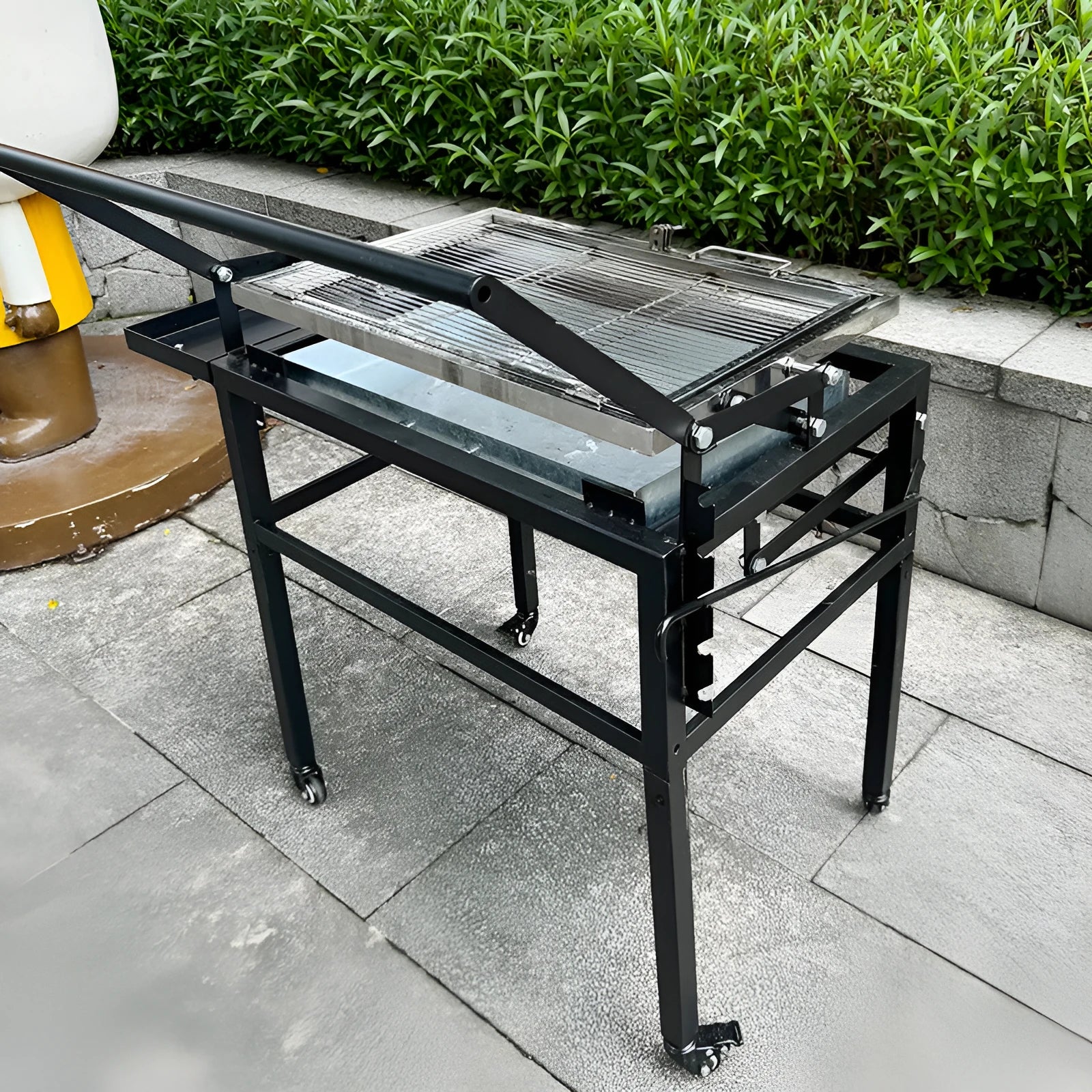 Foldable large charcoal barbecue stove grill for outdoor garden and camp use.