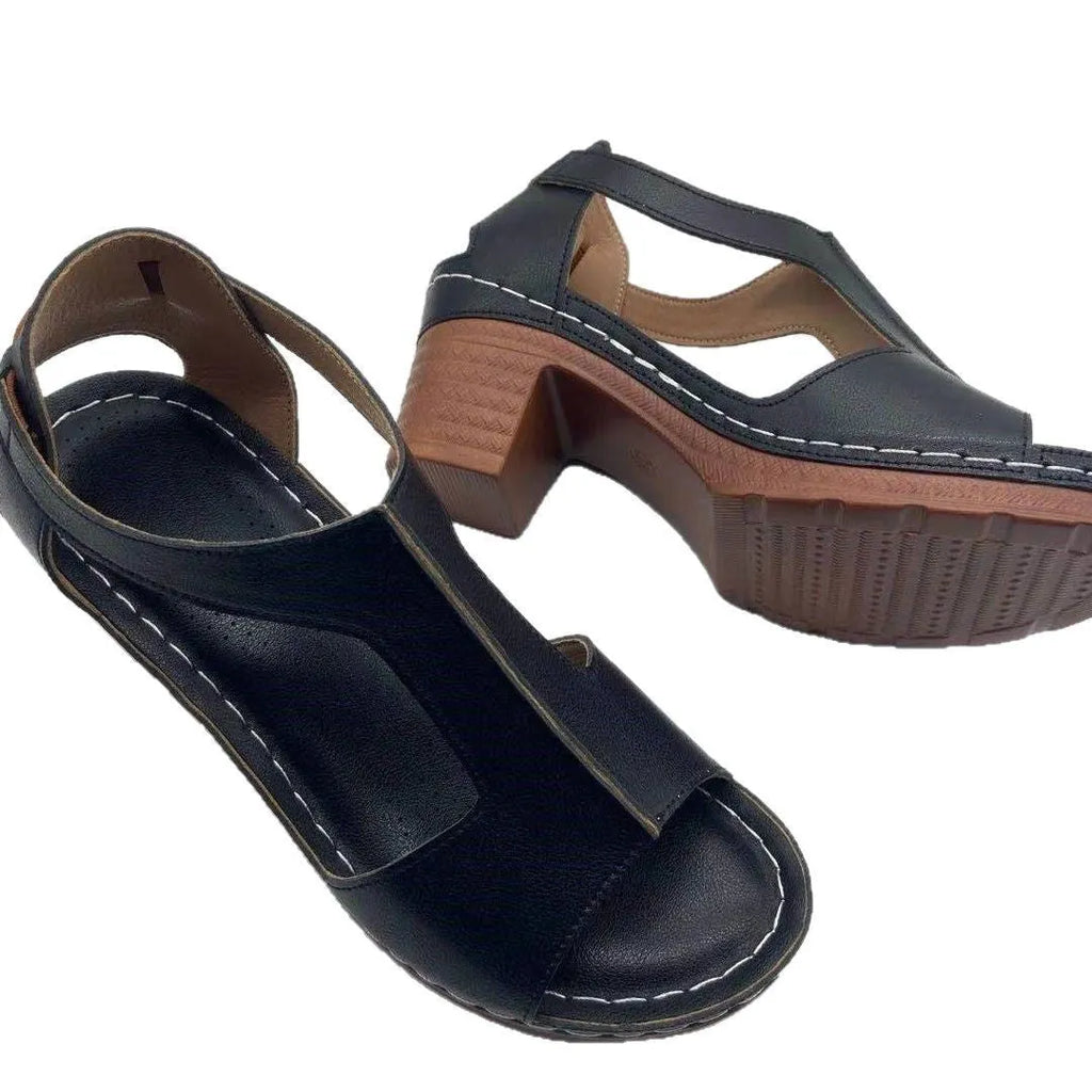 Women's low heel peep toe wedge sandals with a Roman style buckle strap in light brown.
