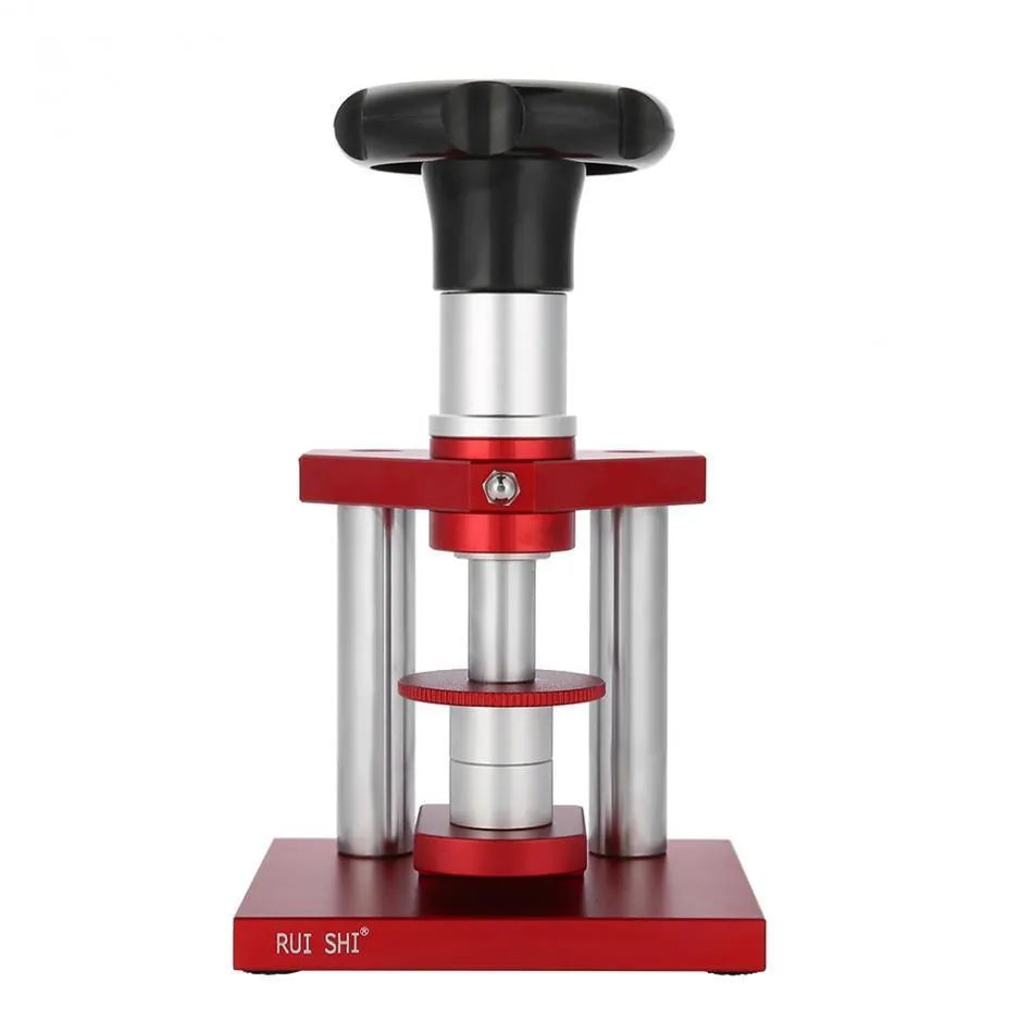 Spiral cap presser watch repair tool with a set of 20 plastic moulds for watch back covers.