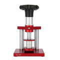 Spiral cap presser watch repair tool with a set of 20 plastic moulds for watch back covers.