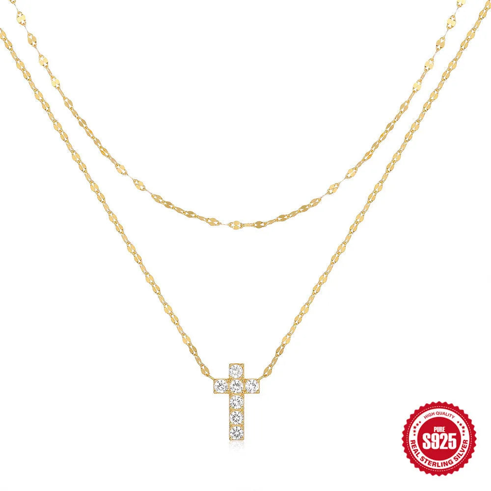 S925 sterling silver double layer twin diamond cross pendant on a gold plated clavicle chain.