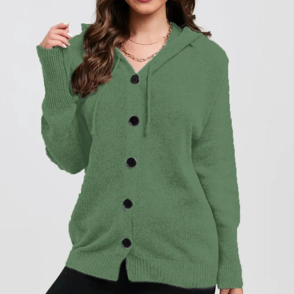 Women's loose-fit hooded cardigan in thick coloured cotton, shown in a solid colour with long sleeves.