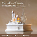 White medieval castle design waterless aromatherapy machine with ambient light on a wooden surface.