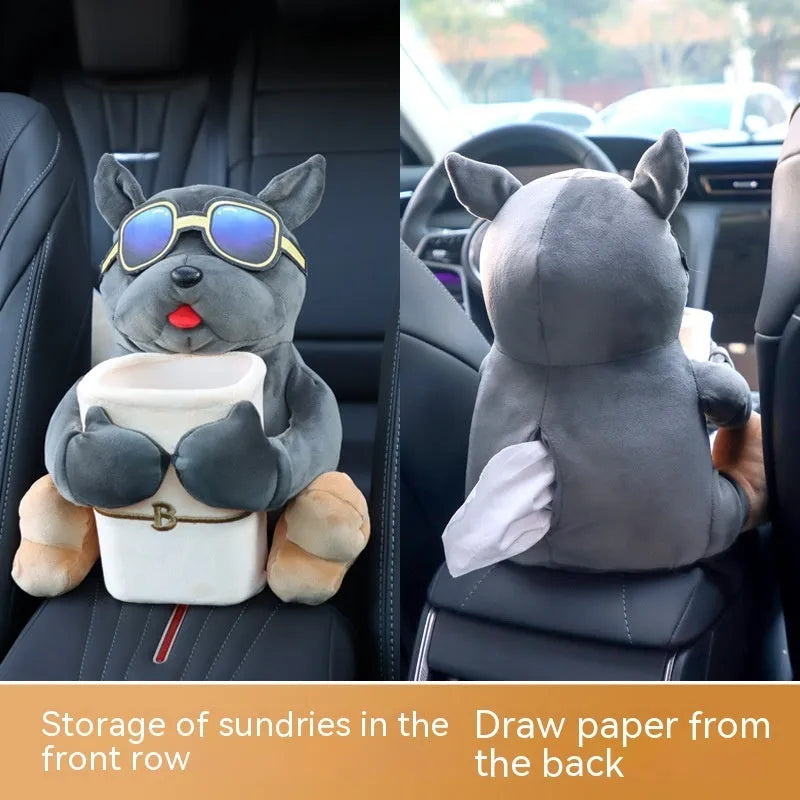 Car tissue box with plush fabric and dog designs hanging from vehicle armrest