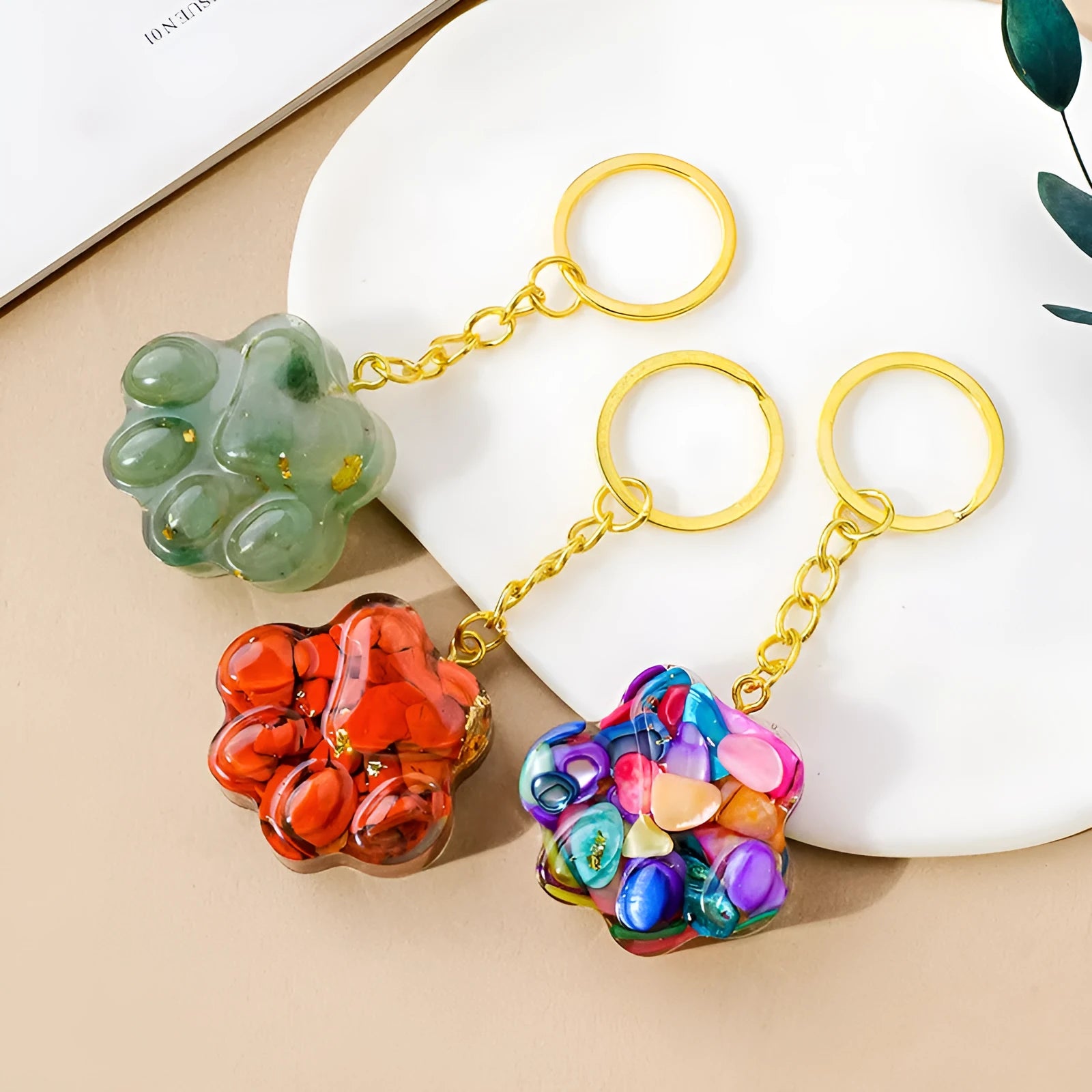 Handmade natural crystal cat's paw keychain pendant in choice of ten stones including pink crystal and turquoise.
