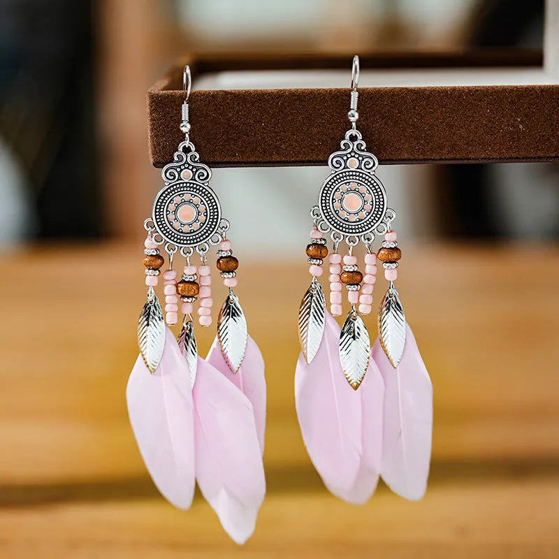 Bohemian style round drop feather earrings with leaf design in alloy, showing electroplated finish.