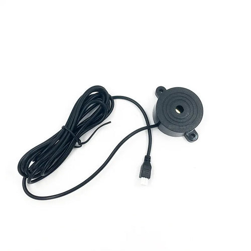 4-probe buzzer-only car reversing radar kit with sensors, control module, and hole saw on a grey background.