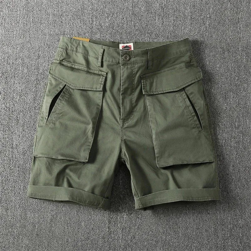 Men's straight leg cargo shorts in khaki with multiple pockets, made from micro-elastic cotton fabric.
