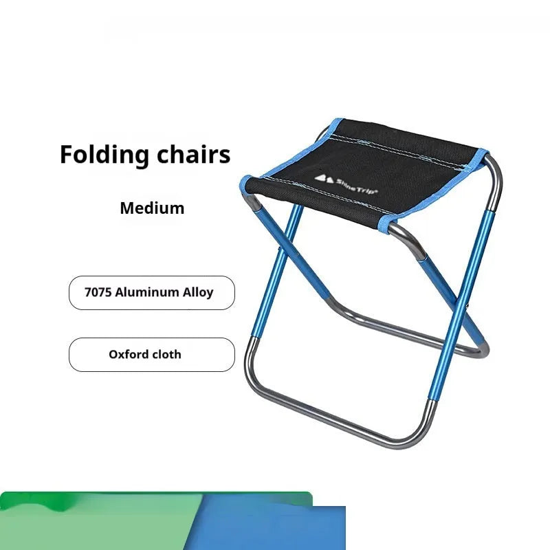 Black folding camp stool with aluminium alloy frame shown in open and folded positions.