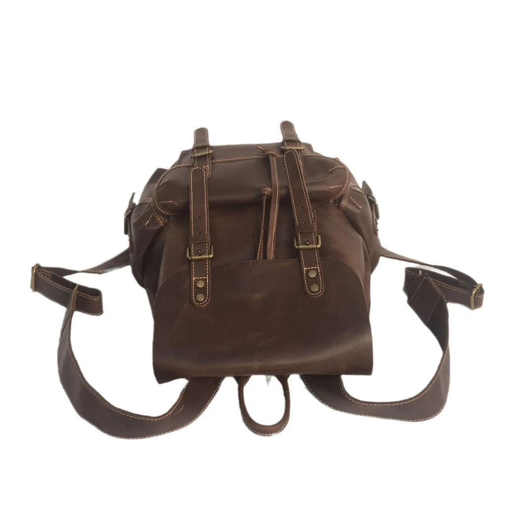 Brown coffee genuine leather men's backpack with air cushion shoulder straps showing first layer cowhide texture