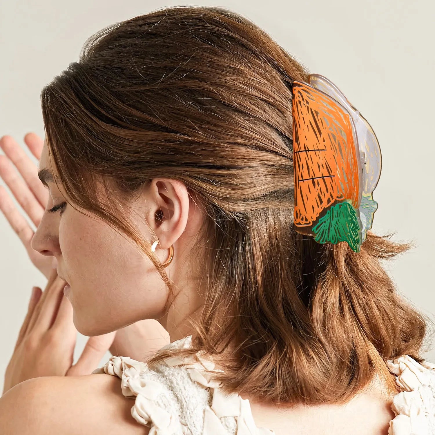 Transparent PVC hair clip with fruit design in asymmetric shape, available in 12 colour options A28
