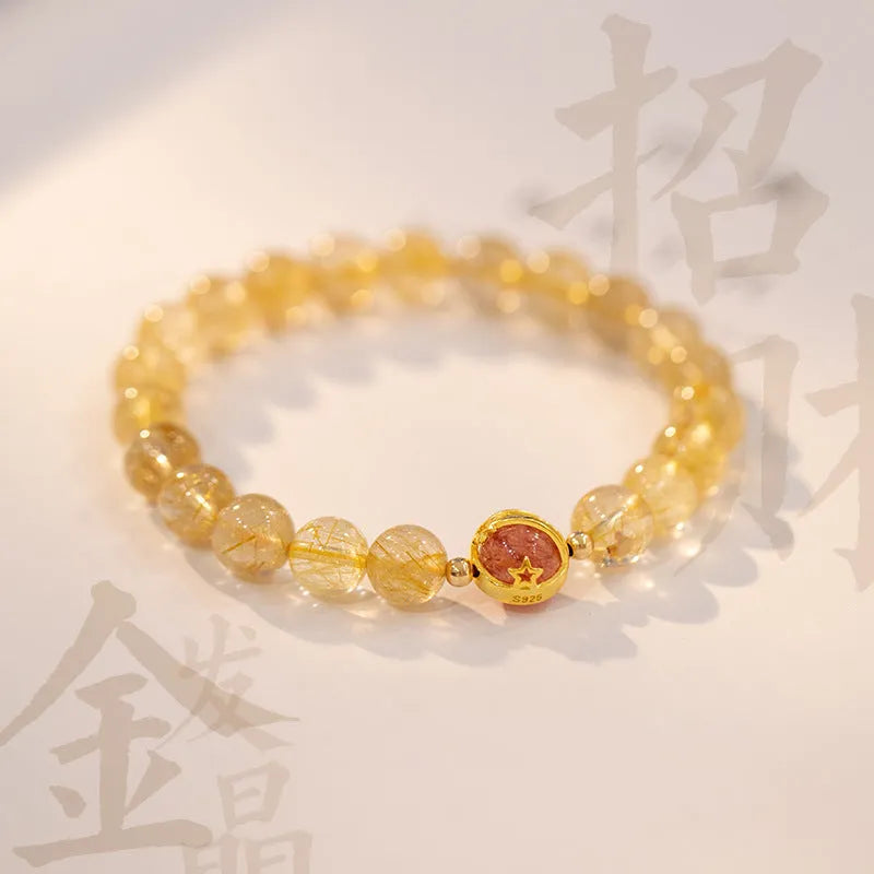 Natural citrine and gold rutilated quartz crystal bracelet with diamond-shaped beads