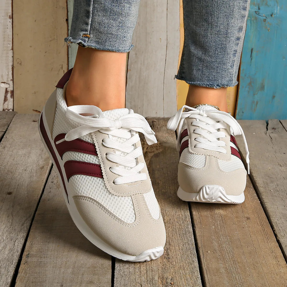 Wine red Cortez Retro sneakers with cross strap design and mesh lining