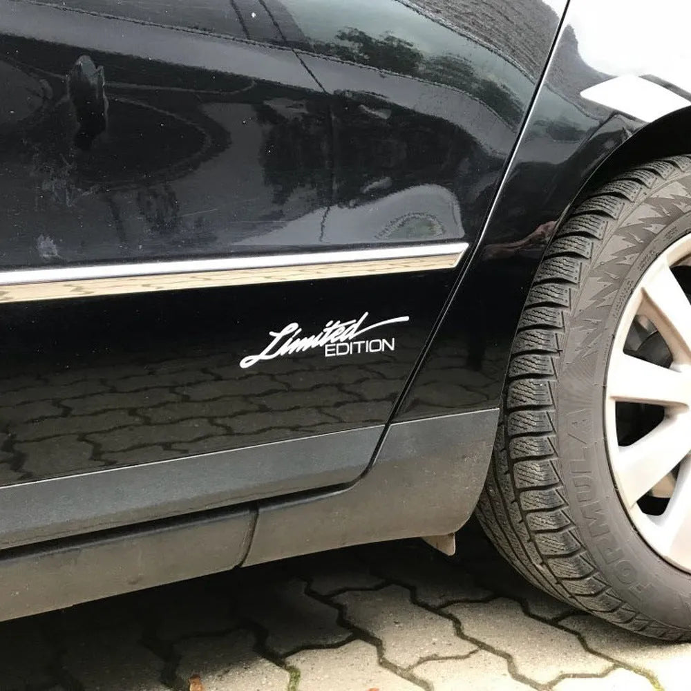 Reflective British-style bumper sticker showing black, white, and colourful options, size 16cm by 3.8cm.
