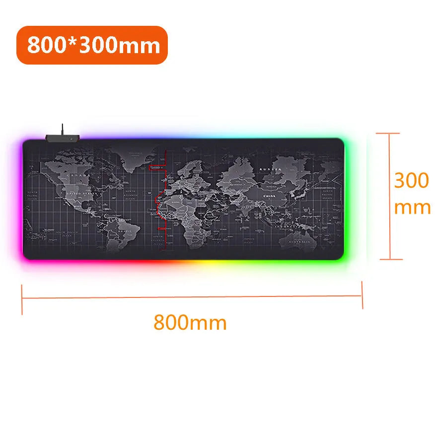 Large RGB gaming mouse pad with colourful seaming and waterproof cloth surface on a desk