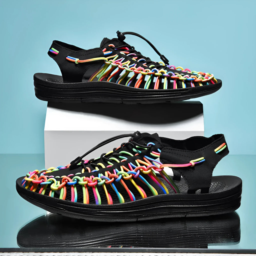 Woven sandals with an elastic drawstring tie closure in a rainbow colour option