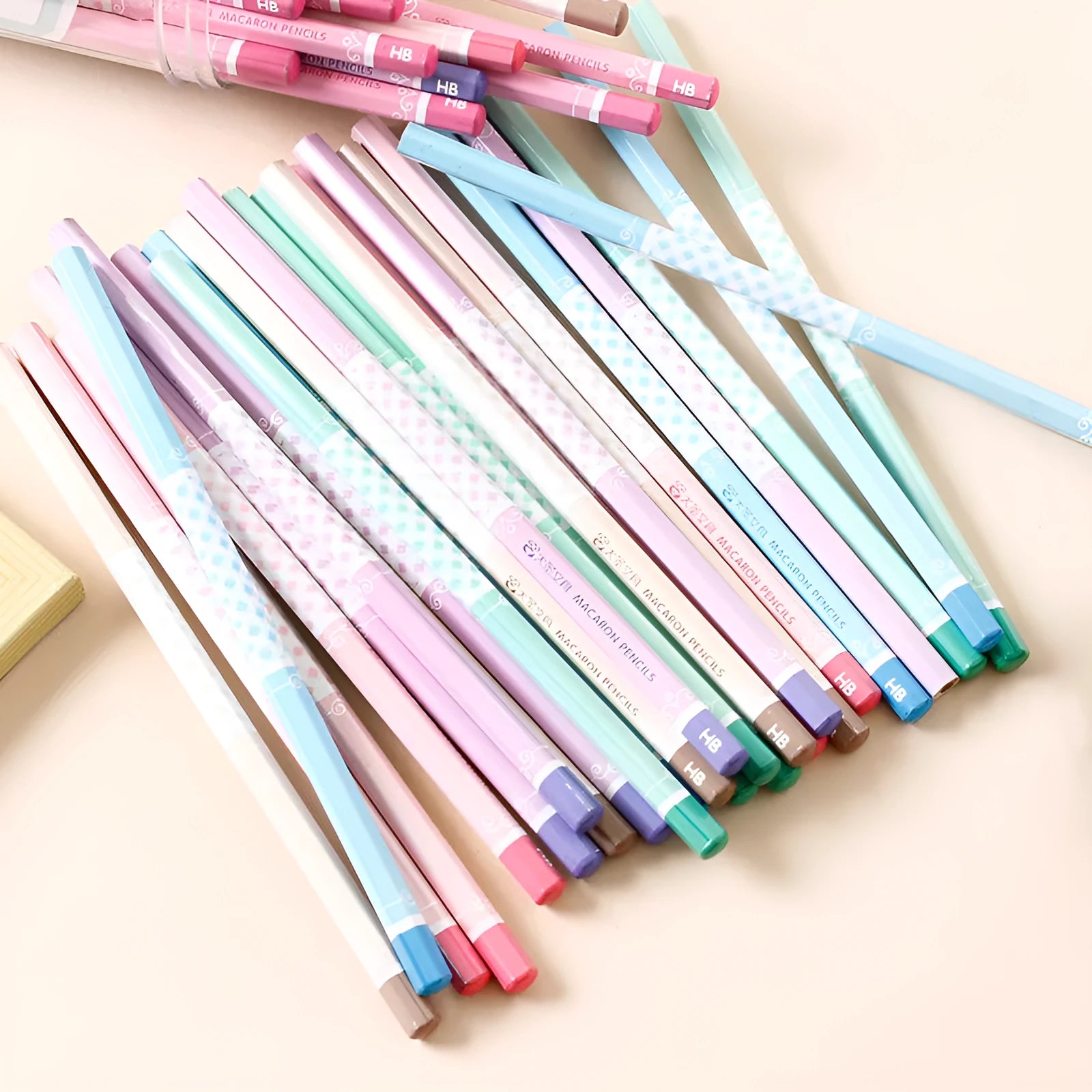 Basswood six-angle rod thermal transfer pencil with HB refill, shown in a barrel of 50 pieces.