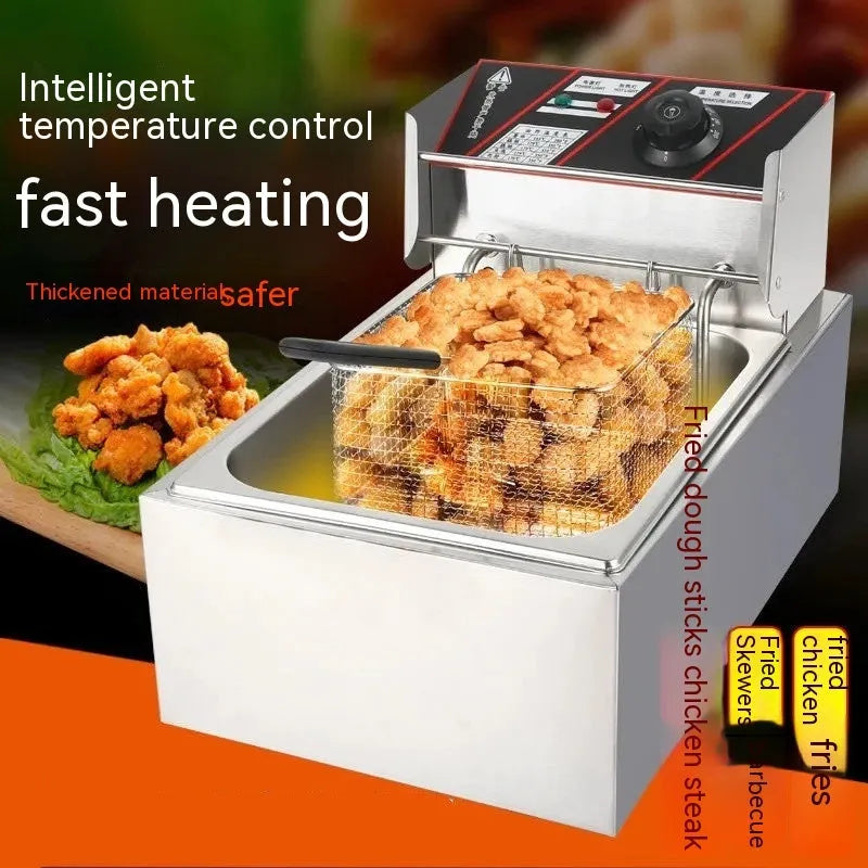 Stainless steel commercial deep fryer with large oil tank, lid, and two wire frying baskets