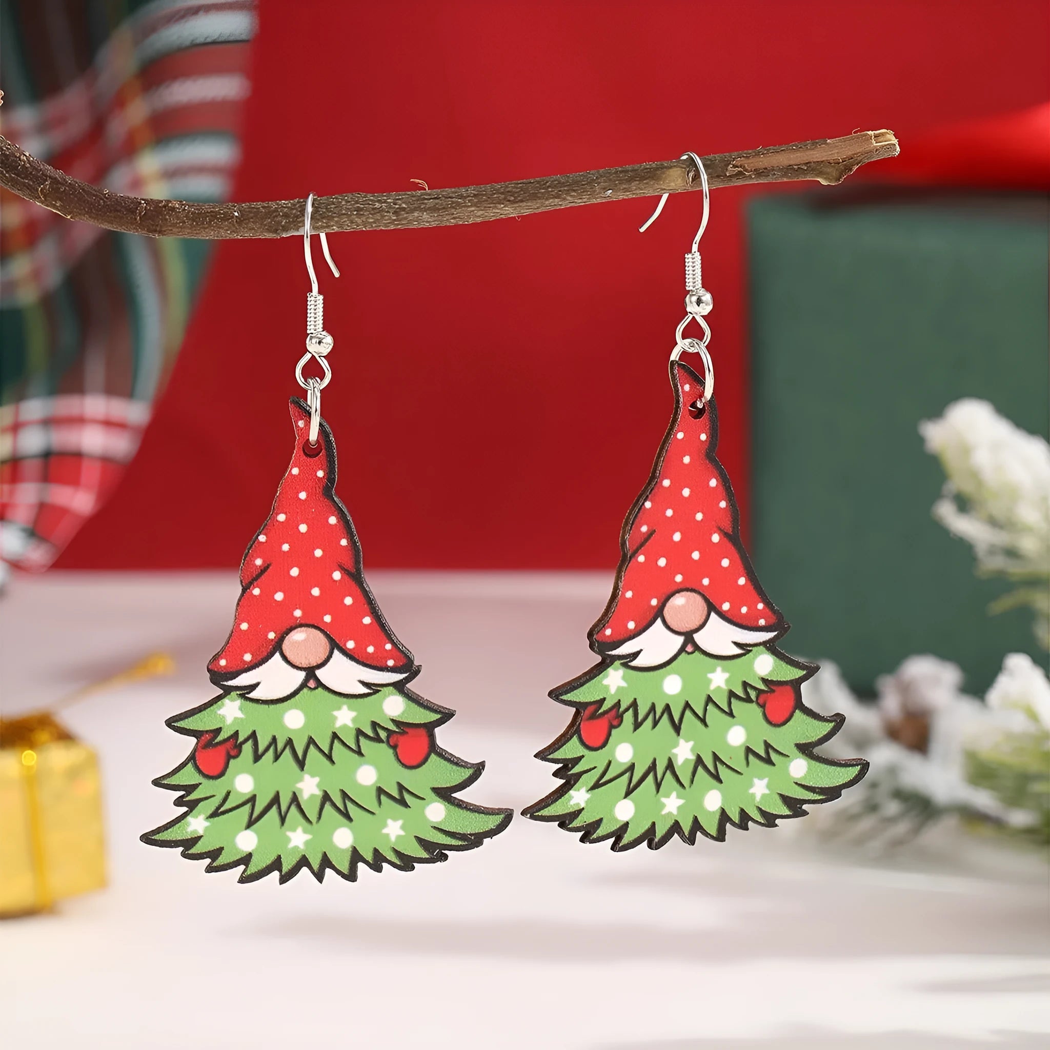 Pair of wooden geometric Christmas earrings with Santa Claus design in red and green colours.