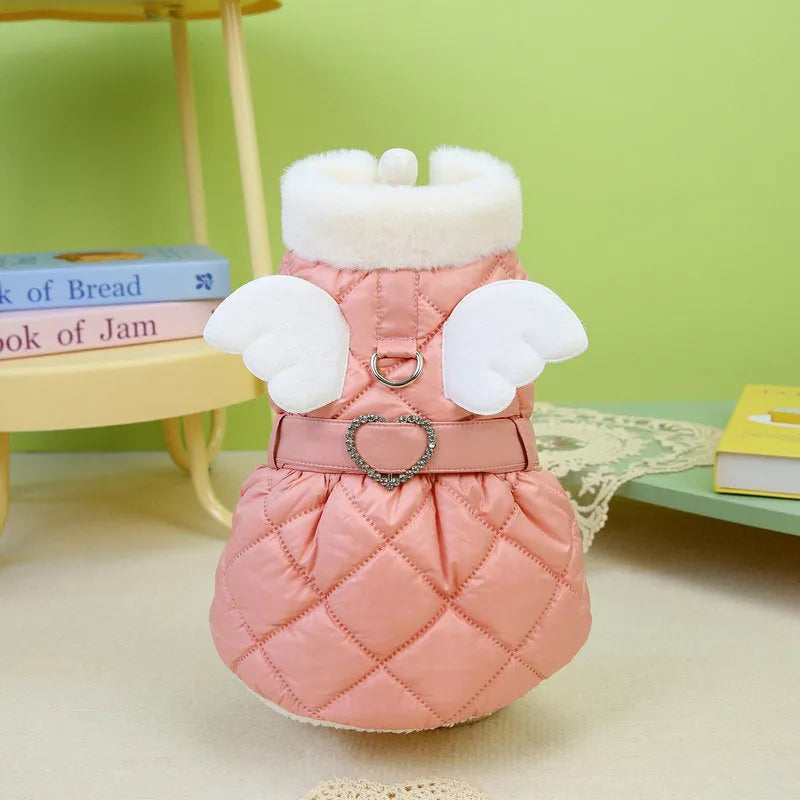 Small dog wearing pink cotton-thickened polyester skirt with cute angel design