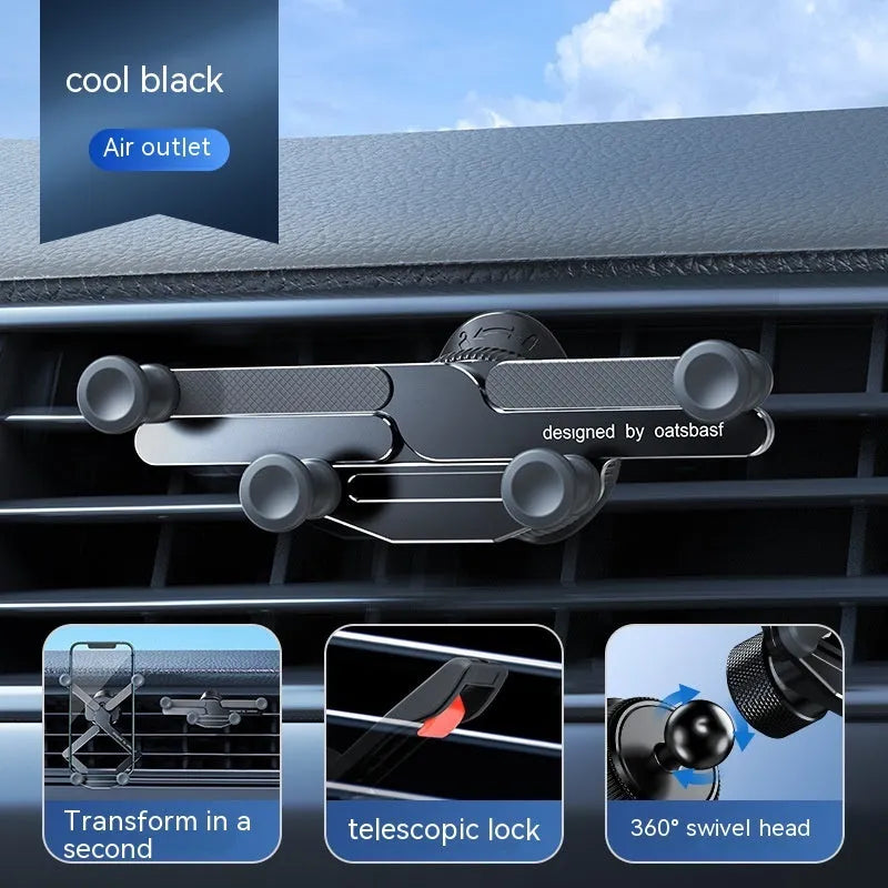 Silver aluminium alloy car phone holder with snap-on bracket mounted on a car air vent