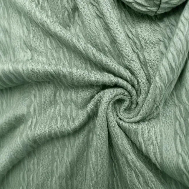 Green women's loose hooded zip-up coat on a hanger, showing front zipper and long sleeves.