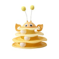 Cat toy tower with rotating bee toy and three-layer trackball in green plastic, placed on a wooden floor