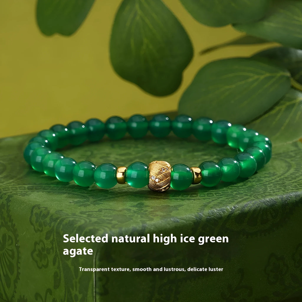 Green agate and sterling silver bracelet with yellow gold plating and 6mm geometry beads.