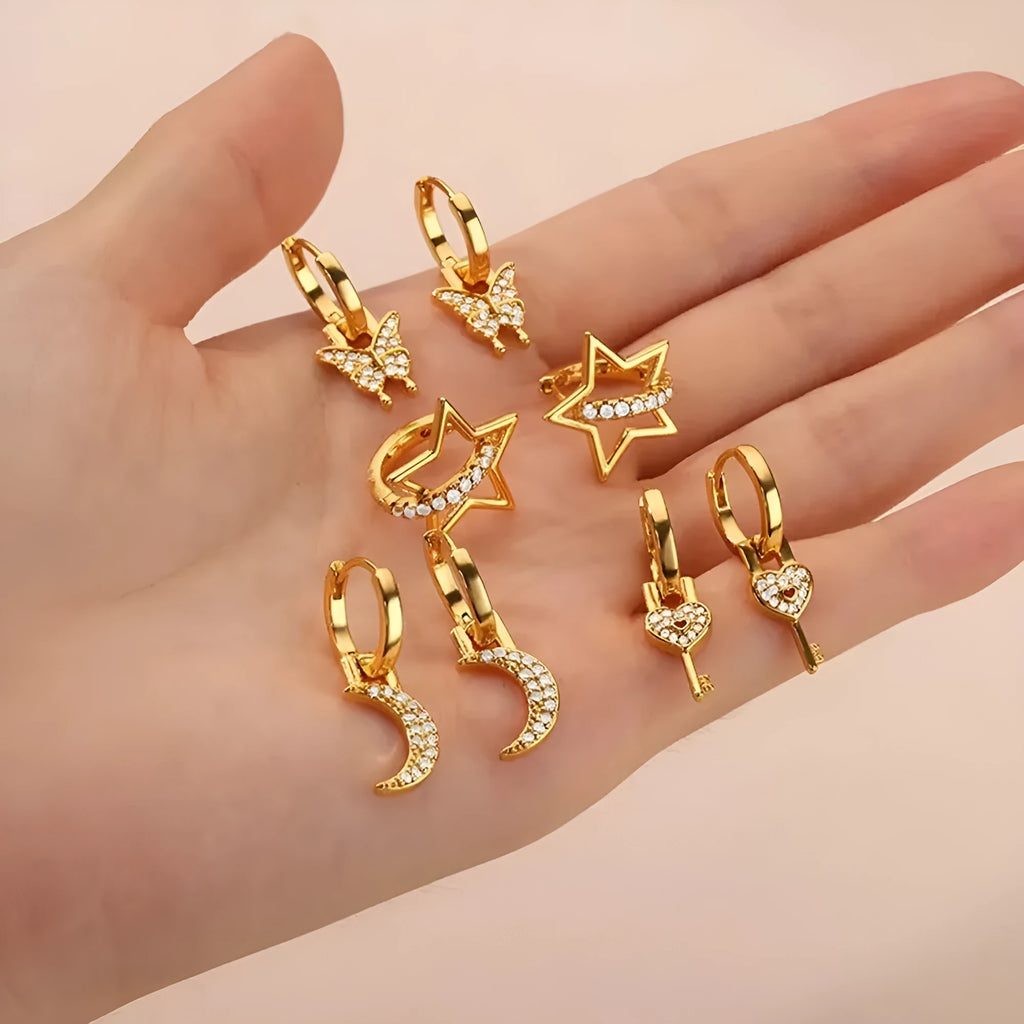 Women's copper geometric butterfly earrings with heart, bow and star details