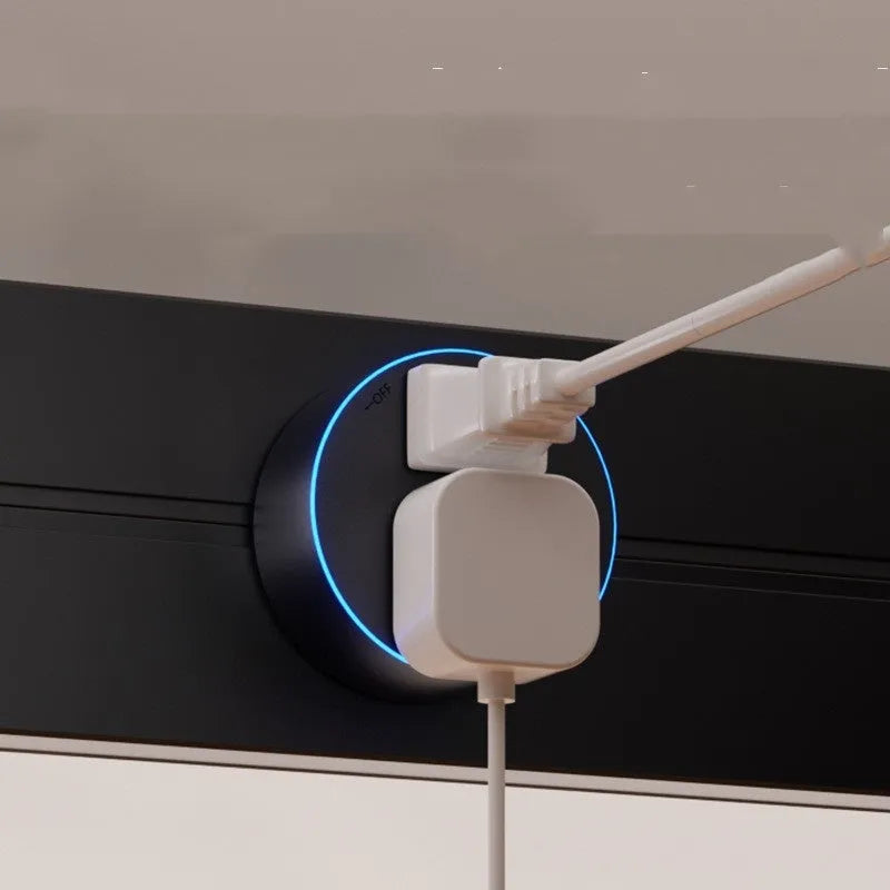 Induction lamp rail socket in black on a sideboard cabinet track with white background