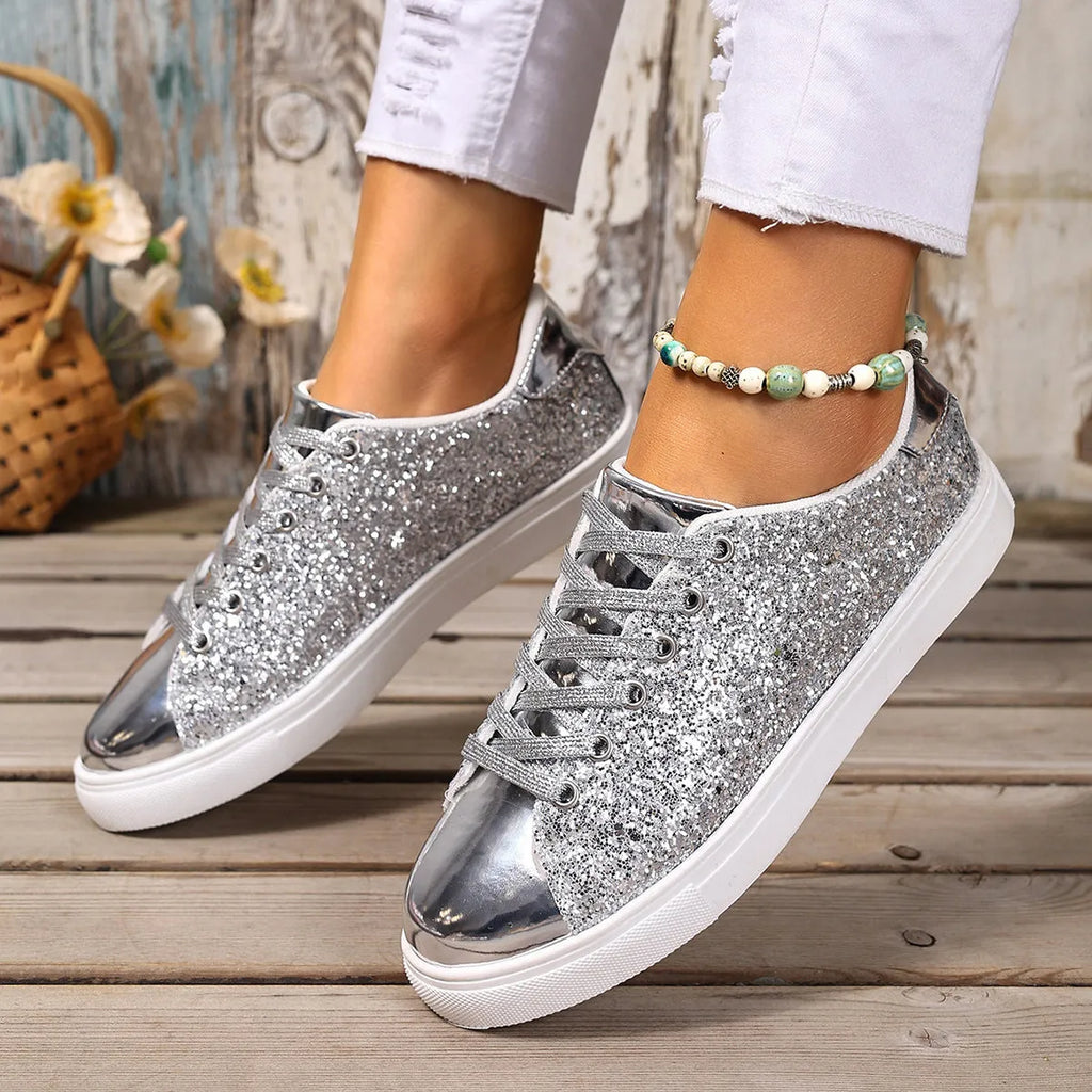 Women's plus size sequinned board shoes with front lace-up closure in black, gold, purple, and silver colour options