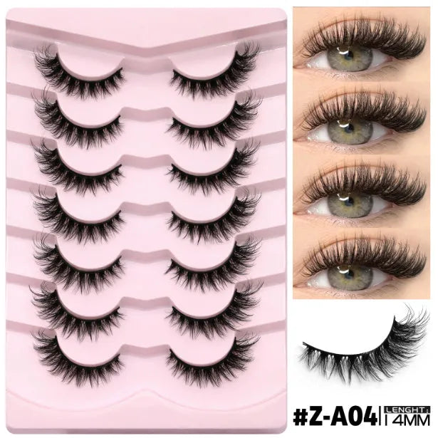 Box of artificial fibre false eyelashes in a natural long thick style with adhesive glue.