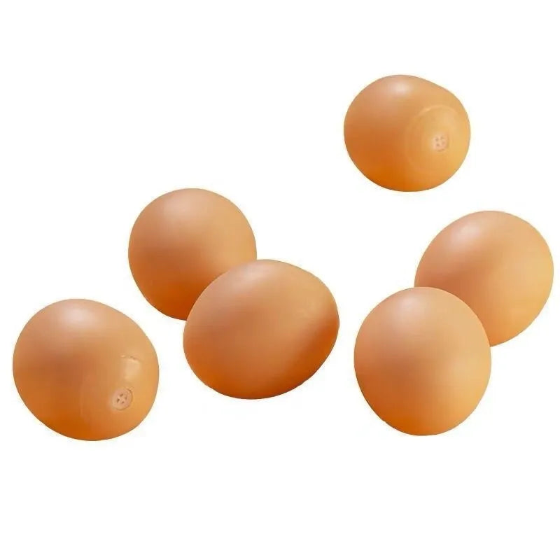 Realistic egg-shaped dog chew toy with textured surface and sound-emitting features for interactive pet play