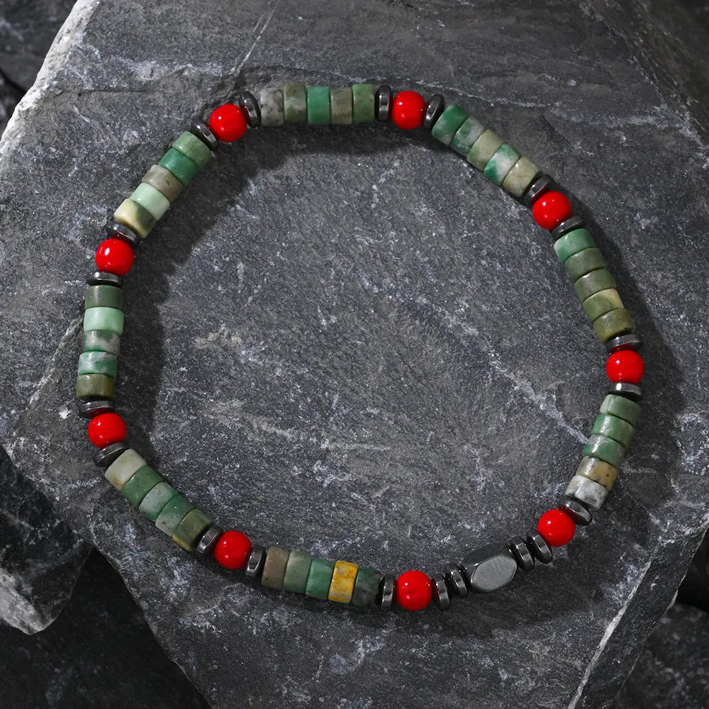 Men's hand-woven bracelet with cylindrical semi-precious stone beads on a string.