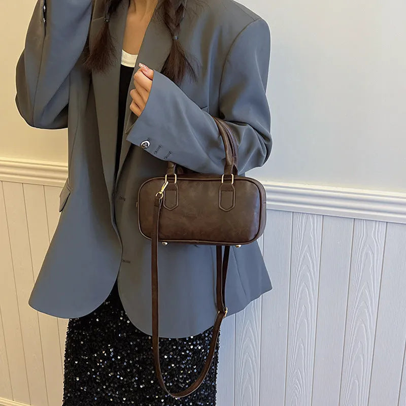 Small PU crossbody bag for women with zipper closure and hidden pocket in Black, Bronze, or Coffee